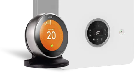 Nest Learning Thermostat with digital display and control panel for temperature management and home automation.